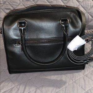 Barney’s black leather dome purse